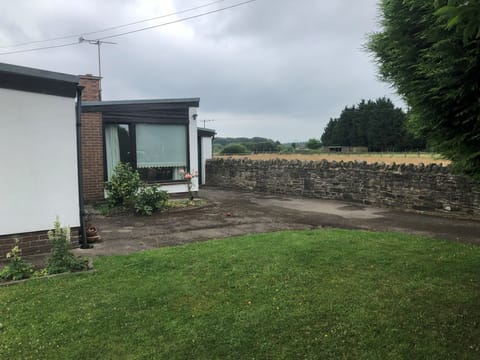 Large front garden with driveway and off-road parking