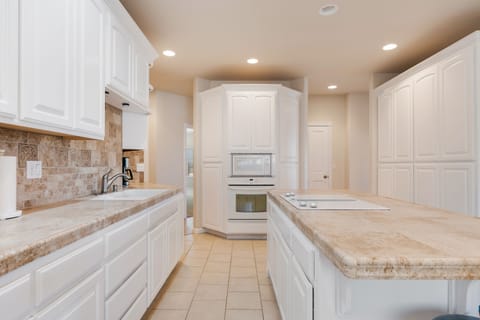 Kitchen is well stocked with all the essentials.