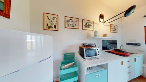 discover a fully stocked space, fully equipped kitchen