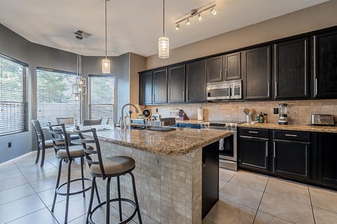 Kitchen looking into backyard