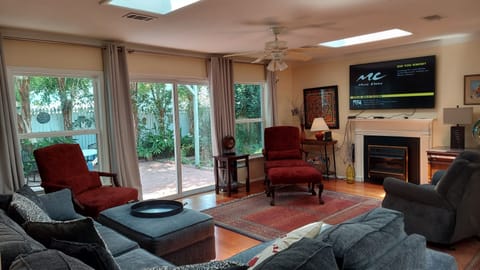  Smart t.v. ,sectional couch, 2 wingbacks,recliner, electric fire place. 