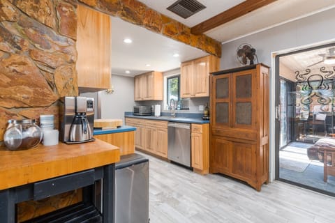 Coffee station for the morning. Galley kitchen to prepare meals.