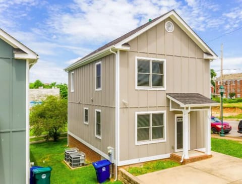 The home's parking pad fits 4 cars
