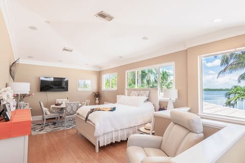 Master Suite.  Furniture has changed and now offers 2 queen beds, table, futon