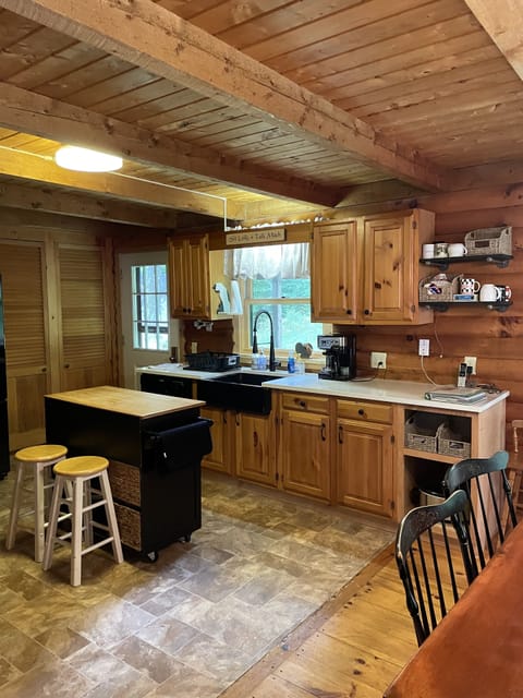Kitchen  w/farmers sink, dishwasher, French door fridge/freezer, gas stove.