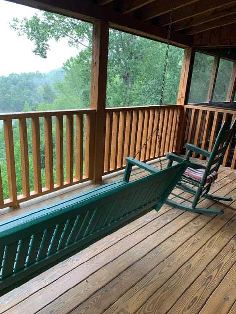 Enjoy lake views from back deck just outside master bedroom 1 on the main level