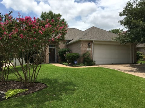 Front view of house and garage from Burning Tree Court
