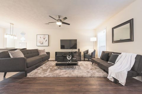 Modern Living Room space with Flat Screen 4K TV, Cable Provided