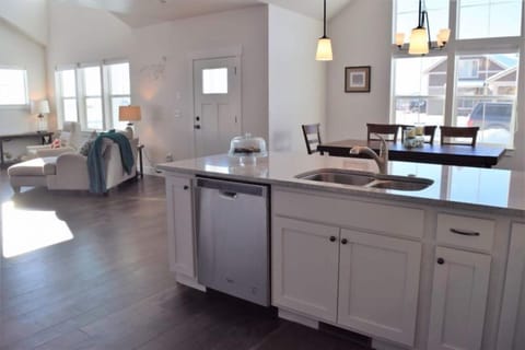 The home offers an open- concept layout in the main living space.