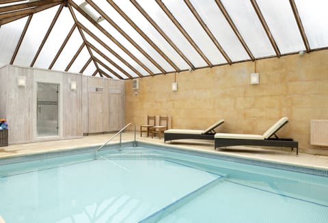 Enjoy access to the heated indoor swimming pool and steam room at Cats Abbey Cottage