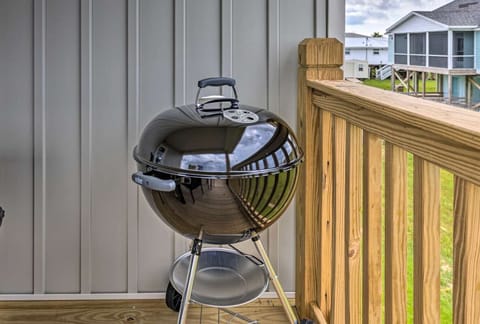 Charcoal grill and briquettes provided