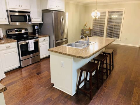 Kitchen Stocked with Cookware and Utensils