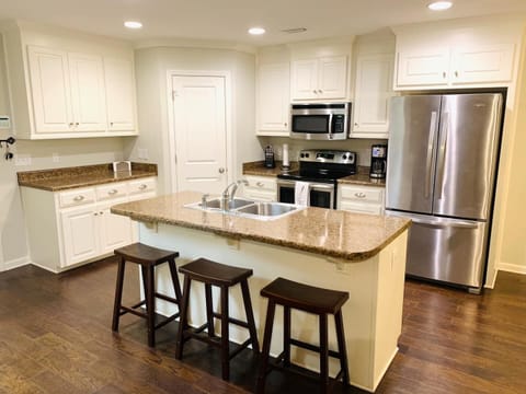 Kitchen Stocked with Cookware and Utensils