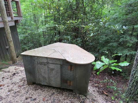 The granite countertop lets you prep by the fire