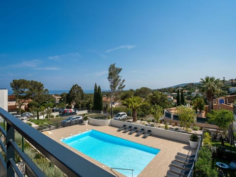 Sky, Plant, Property, Water, Azure, Swimming Pool, Building, Tree, Body Of Water, Cloud