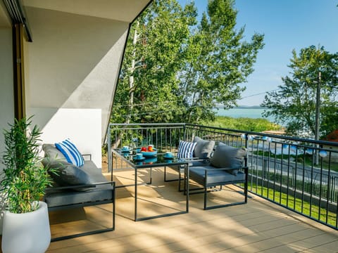 Plant, Property, Sky, Shade, Outdoor Furniture, Interior Design, Architecture, Chair, Urban Design, Flowerpot