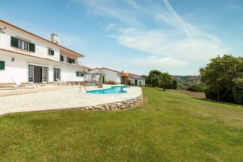 Garden. The terrace with a great view on the pool, garden and BBQ area below
