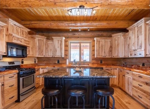 The large kitchen provides plenty of room for group meals.