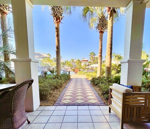 Walk DIRECTLY out to the gorgeous lagoon pool and beautiful landscaping. 