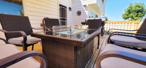 Outdoor deck with gas & charcoal grill, plus a fire pit