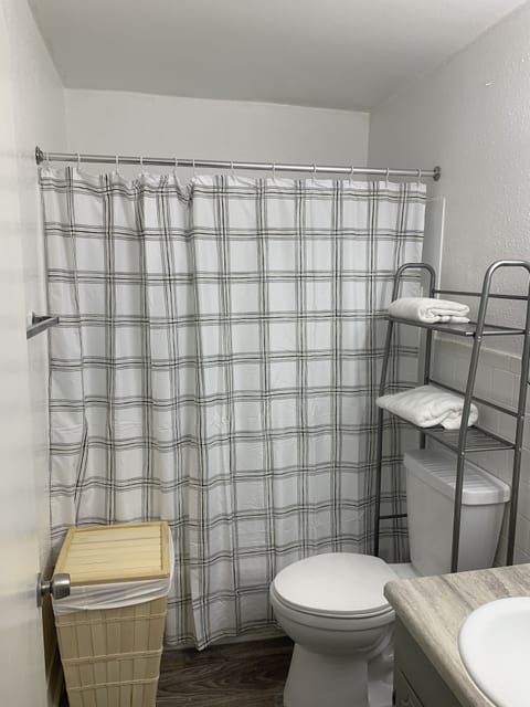 Bathroom with shower and bathtub combo 