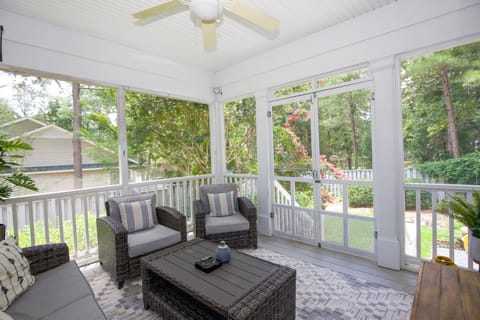 Welcome to our screened porch!  Gardenia shrubs provide fragrance in the Spring!