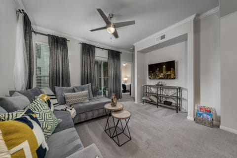 Spacious Living Space + 50" Smart TV + View of Master Bedroom