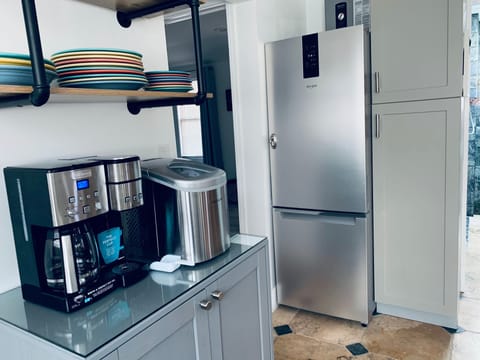 Coffee Maker, Ice Maker, Fridge and Dishes