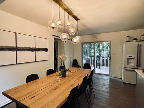 Dining room overview, seating for 8, sliding patio door to deck and backyard