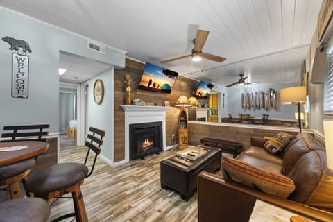 New Flooring, leather sofa and new table with barrel chairs