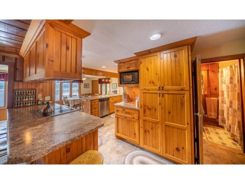 Centrally located and open kitchen.  High end appliances and view of the lake.