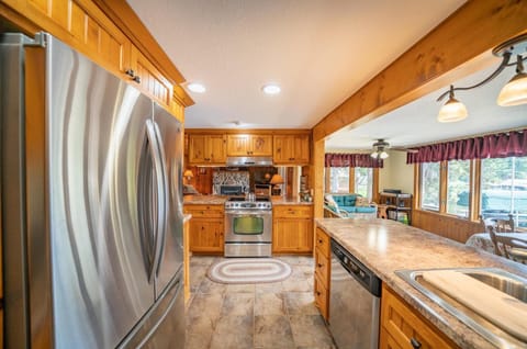 Centrally located and open kitchen.  High end appliances and view of the lake.