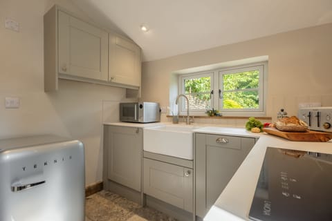 Ground floor: Kitchen with window overlooking the garden