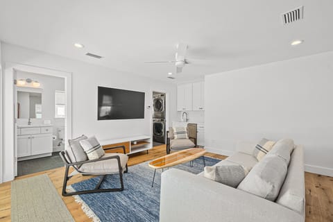 Modern, beachy vibes give this home the perfect ambiance