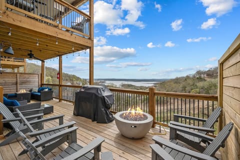 Fire bowl, Adirondack chairs, large Weber grill, + a great lake view = perfection!