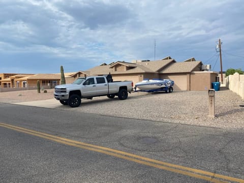 Front of property with spacious parking
