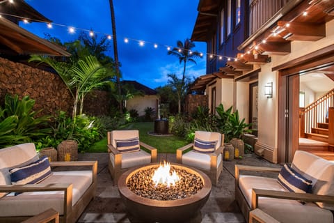Enjoy the fire pit and comfortable seating. 