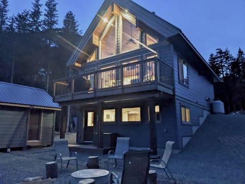 back exterior, hot tub and fire pit
