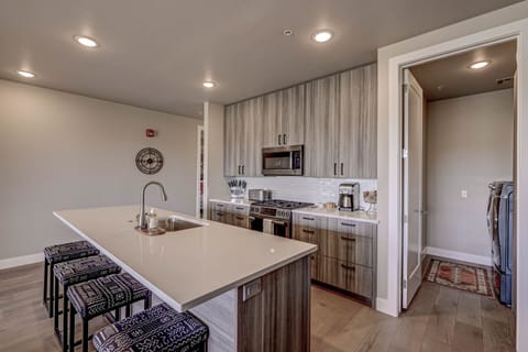 Kitchen island and door to laundry room.