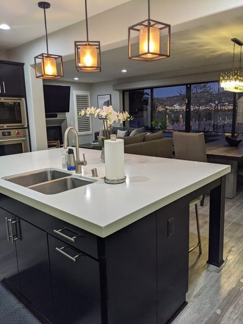 Large kitchen island with Quartz counter top
