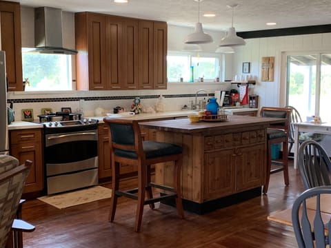 Kitchen view with kitchen island