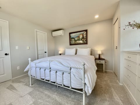 Bedroom #1 with queen bed and ensuite full bathroom (upstairs)