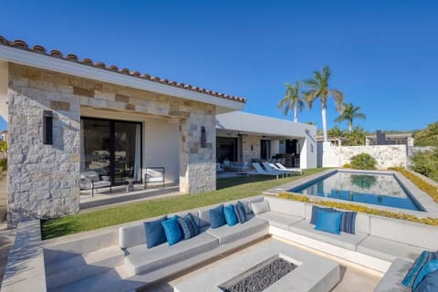 Enjoy the heated pool, fire pit and covered patio with surround sound system.