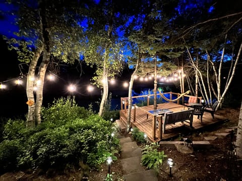 Lower deck on edge of pond at night, enjoy the magical sounds of nature