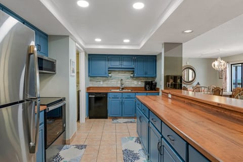 Enjoy cooking in the updated kitchen, featuring modern appliances and a fresh, clean design