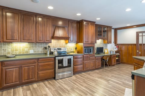 The huge, fully-stocked kitchen has everything you need for big family meals!