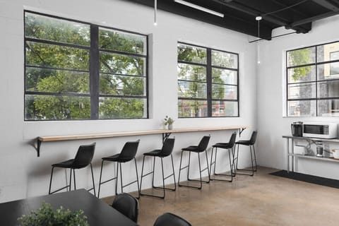 Seating for 6 along the kitchen area's coffee bar. Kitchen stocked with all the items you could need.