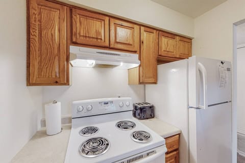 Kitchen includes items to prepare a meal 