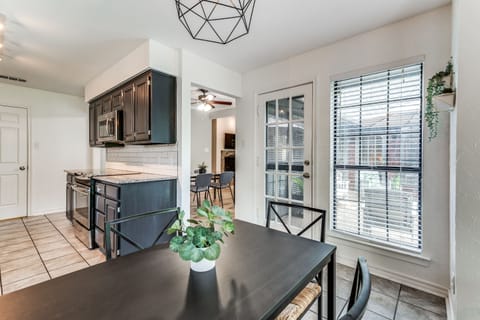 Enjoy your morning coffee in a bright kitchen stocked with coffee + supplies