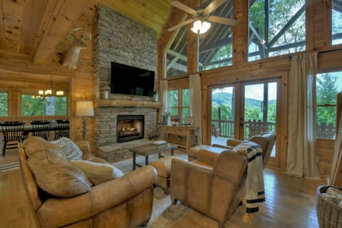Living Room. Enjoy a football game or family movie after a day in Blue Ridge